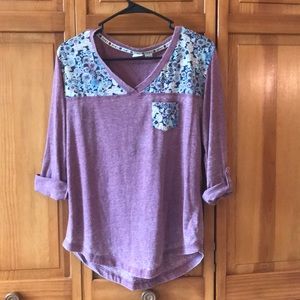 Purple top with floral pattern